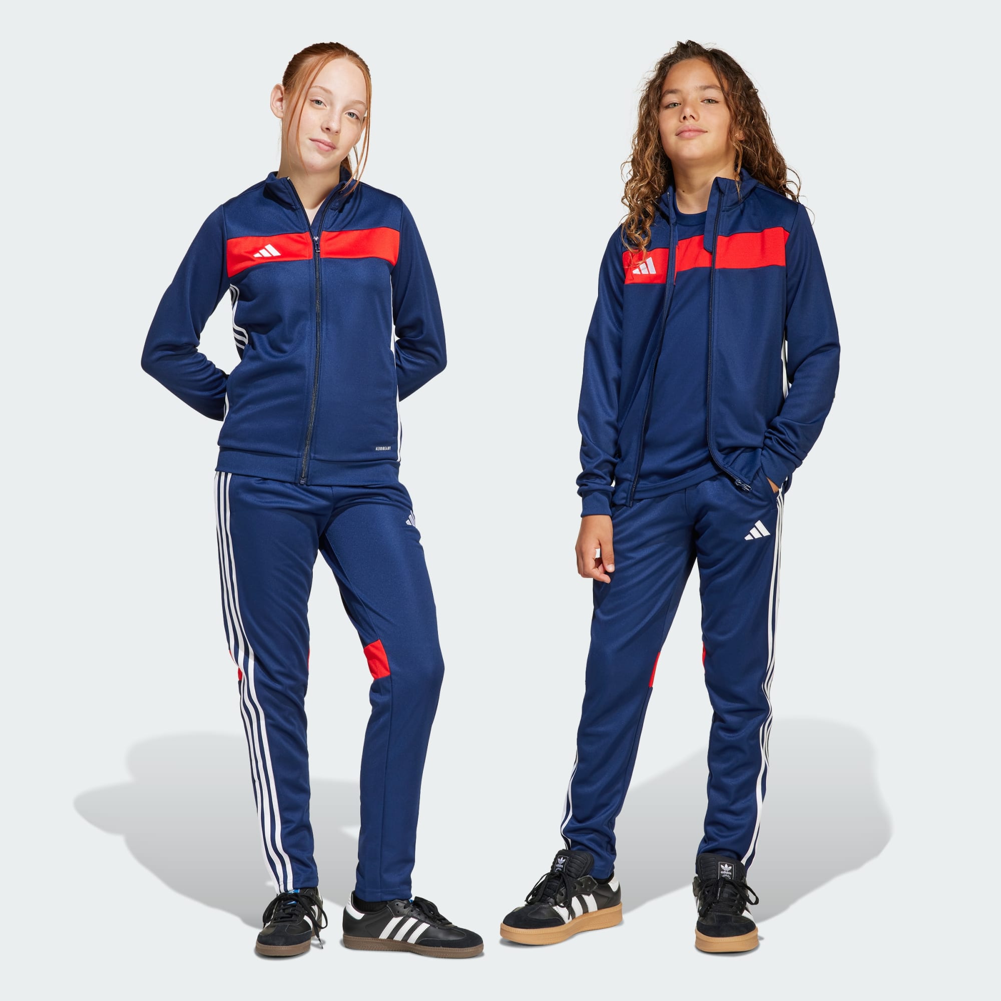ensemble-de-survetement-adidas-tiro-25-essentials-junior-copie-original-algerie-dz.jpg Ensemble de Survêtement Adidas Tiro 25 Essentials Junior – Image 1